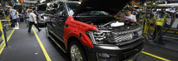 Ford and Nissan will cut vehicle production due to a shortage of chips